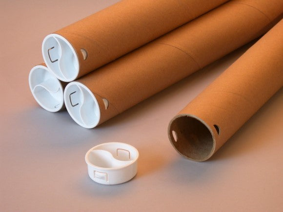brown shipping tubes with white plastic end caps